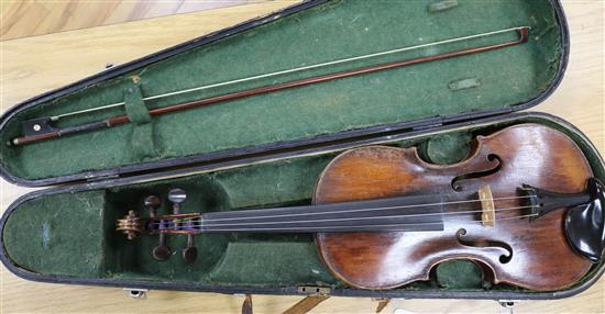 A 19th century violin, two piece back, cased with a later bow